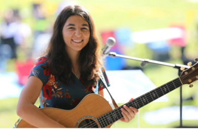 Becky Mann with guitar