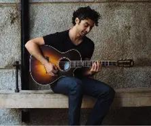 Noah Aaronson with guitar